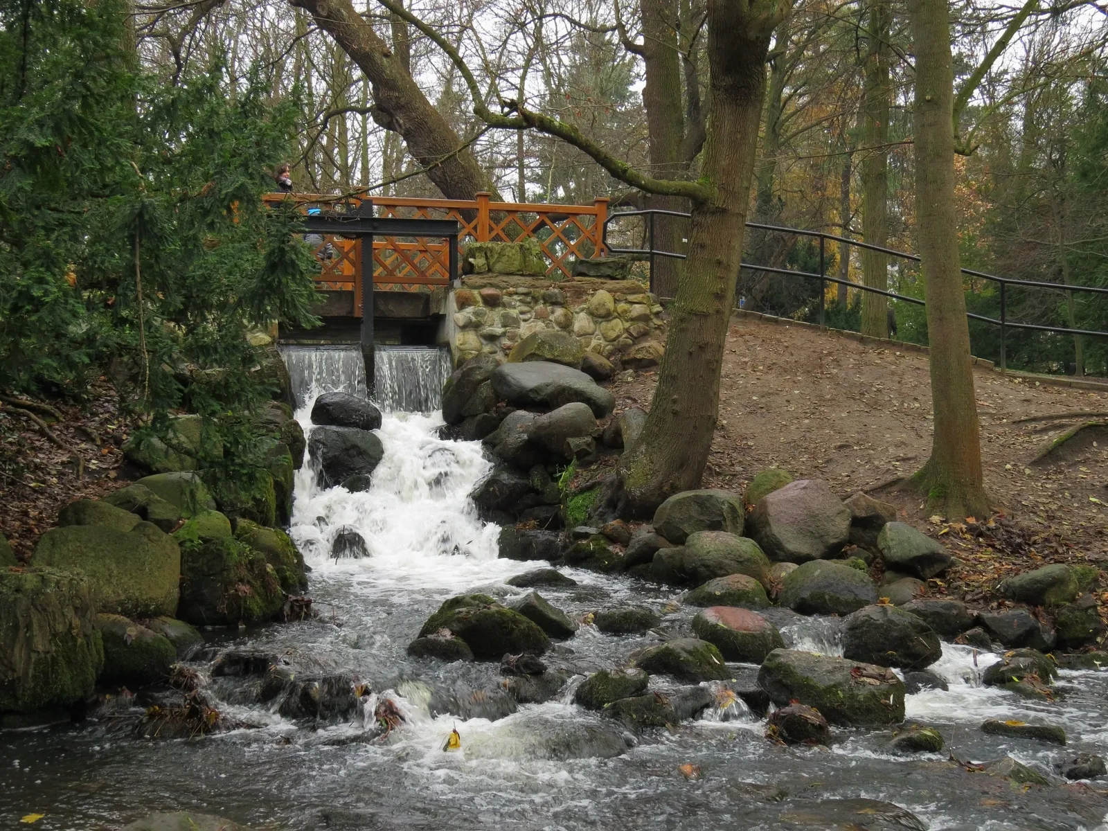 Adam Mickiewicz Park in Gdańsk-Oliwa. Artificial waterfall.