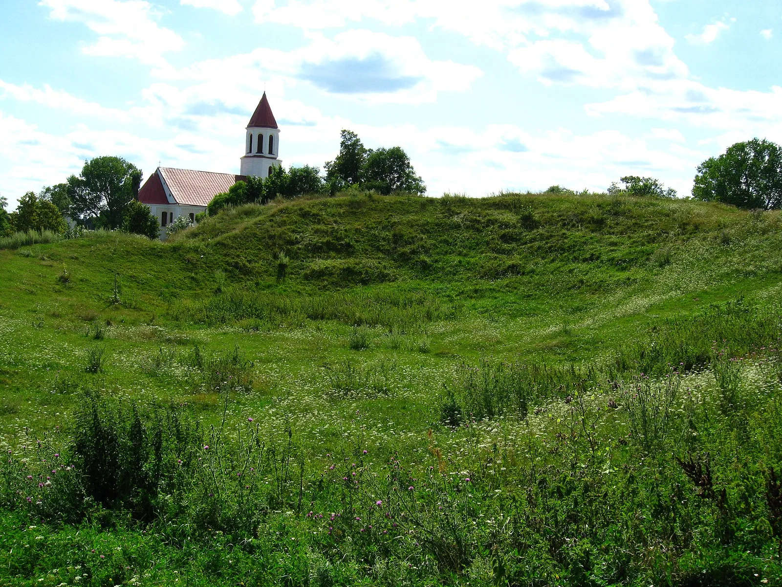 Grad from 11th century „Queen Bona's hill”; in background roman–catholic church of Corpus Christi from 1873-1876