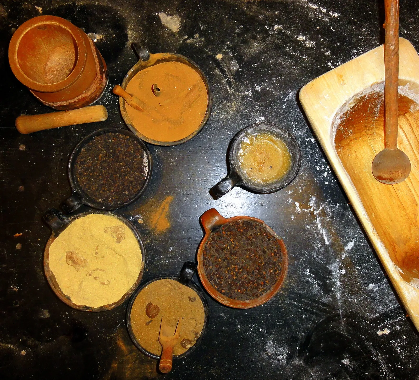 Seasonings traditionally used in the manufacture of Toruń gingerbread (clockwise from top): cinnamon, honey, cloves, nutmeg, ginger and black pepper. The Living Museum of Gingerbre
