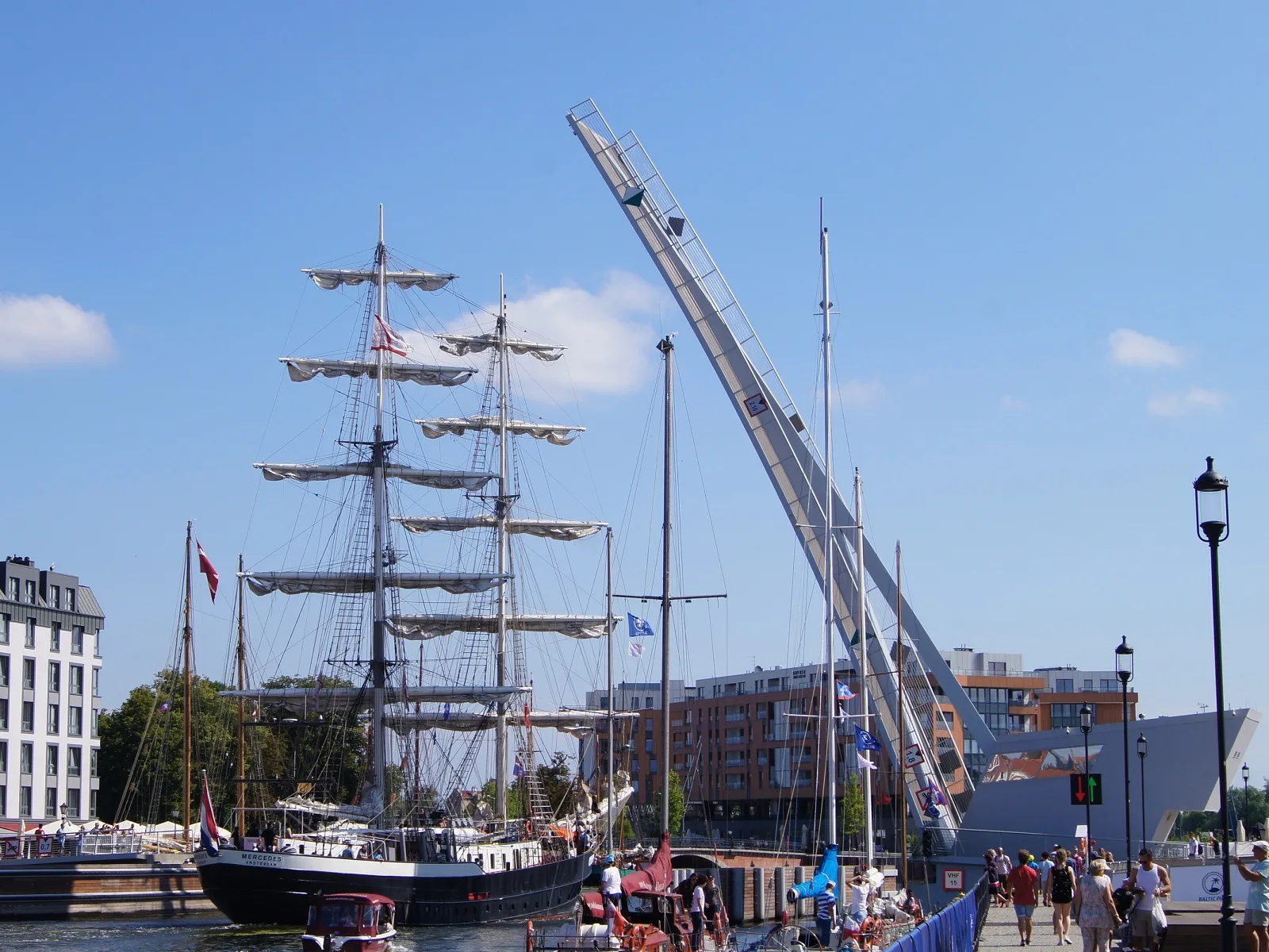 Footbridge in Gdańsk opened, the sail ship Mercedes is passing the bridge.